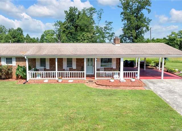 Property at 7121 Ridge Rd, Tobaccoville, NC 27050, 4 beds, 2 baths