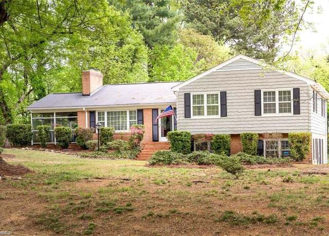 Property at 5718 Northlake Dr, Greensboro, NC 27410, 4 beds, 2.5 baths