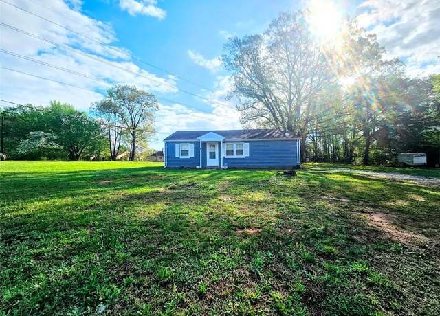 Property at 3710 Flint St, Greensboro, NC 27405, 3 beds, 2 baths