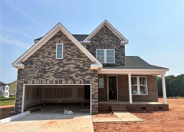 Property at 8502 Lemur Ln, Summerfield, NC 27358, 4 beds, 3.5 baths