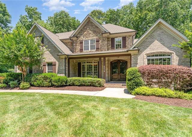 Property at 5216 Harley Stafford Dr, Oak Ridge, NC 27310, 4 beds, 3.5 baths