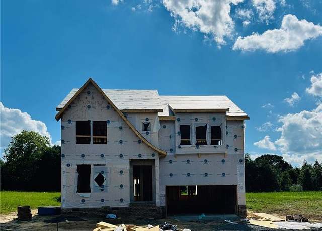 Property at 8605 Lemur Ln, Summerfield, NC 27358, 4 beds, 3 baths