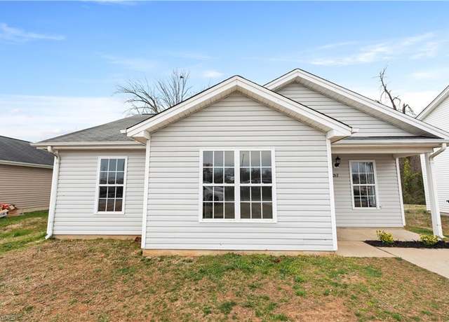 Property at 3217 N Ohenry Blvd, Greensboro, NC 27405, 4 beds, 2 baths