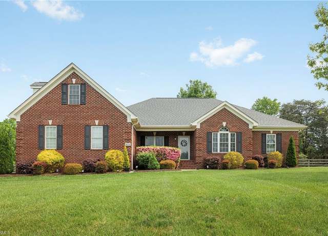 Property at 8210 Hunters Dr, Greensboro, NC 27455, 3 beds, 2 baths