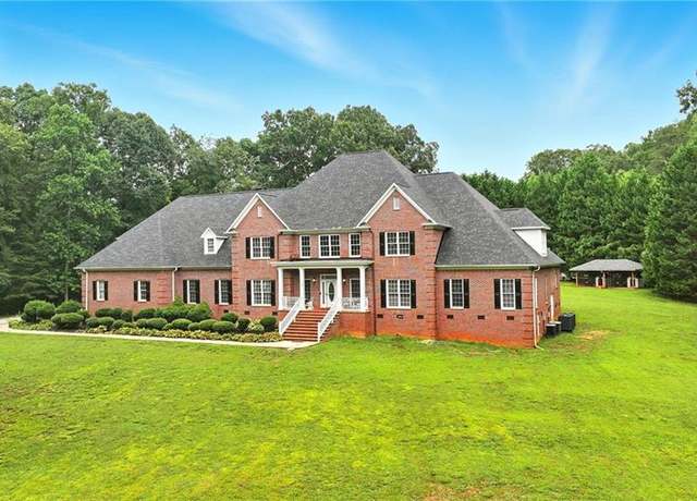 Property at 1218 Enchanted Forest Dr, Browns Summit, NC 27214, 5 beds, 6.5 baths