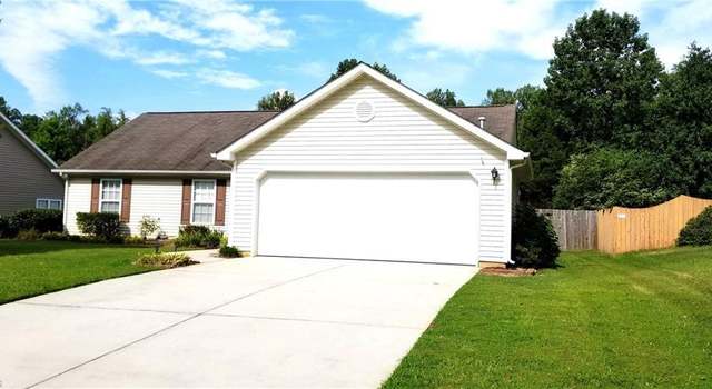 Photo of 704 Walnut Crossing Dr, Whitsett, NC 27377
