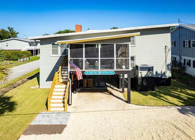 Property at 415 Sundial Dr, Pawleys Island, SC 29585, 5 beds, 3 baths