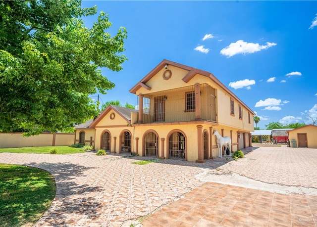 Property at 3211 W Sugar Cane Dr, Weslaco, TX 78599, 4 beds, 4 baths