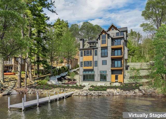 Property at 8 Varney Point Road Left, Gilford, NH 03249, 5 beds, 5 baths
