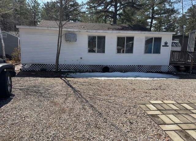Property at 8 Mohegan Run Ln, Freedom, NH 03836, 2 beds, 1 bath