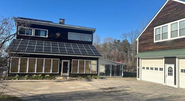Photo of 60 Old Lake Shore Rd, Gilford, NH 03249