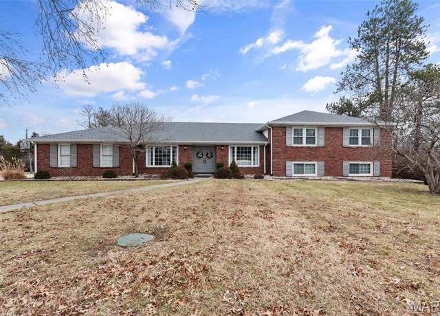 Property at 10571 Windswept Dr, St Louis, MO 63128, 5 beds, 3.5 baths