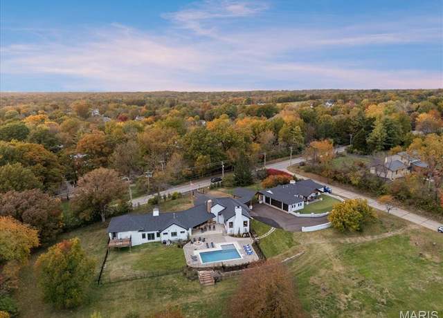 Property at 1824 Topping Rd, St Louis, MO 63131, 5 beds, 4.5 baths