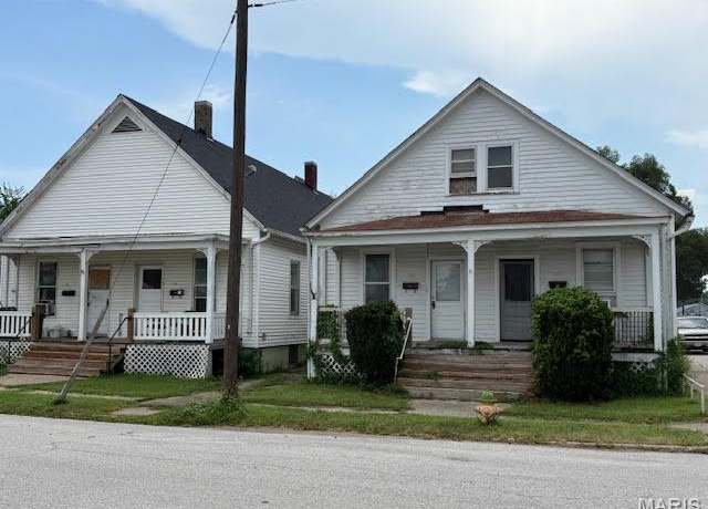 Property at 318-324 S 7th St, Hannibal, MO 63401, 4 beds, 4 baths
