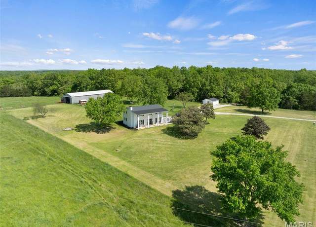 Property at 10715 Calico Rd, Fletcher, MO 63030, 5 beds, 4 baths