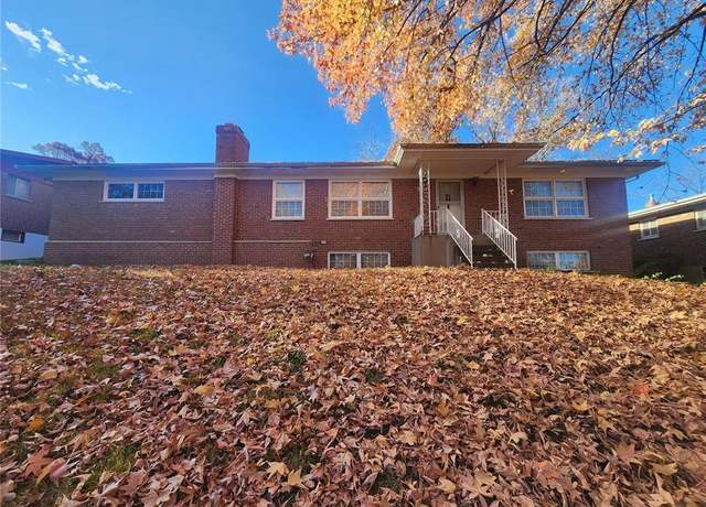 Property at 7712 Nacomis Dr, St Louis, MO 63121, 4 beds, 3 baths