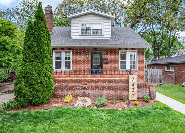 Property at 7439 Wellington Ave, University City, MO 63130, 4 beds, 2 baths