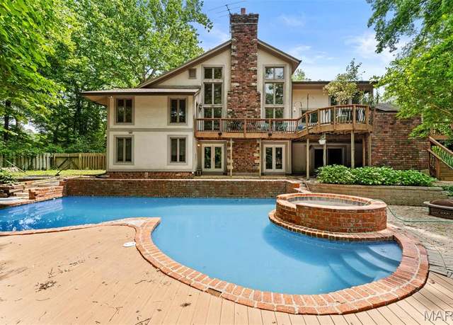 Property at 42 Rolling Rock Ct, Ladue, MO 63124, 4 beds, 4 baths