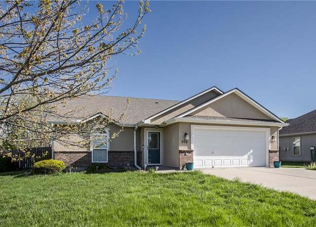Property at 306 E Olive St, Raymore, MO 64083, 3 beds, 2 baths