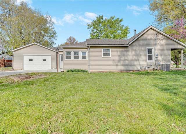 Property at 107 E Olive St, Raymore, MO 64083, 3 beds, 2 baths
