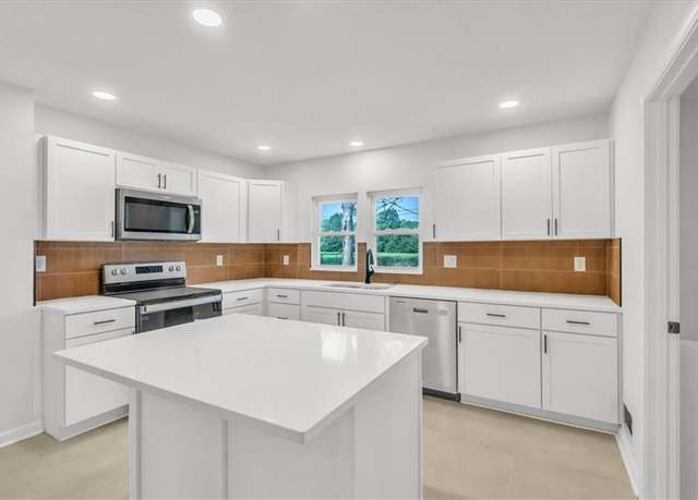 Property at 12926 Virginia Ave, Kansas City, MO 64146, 3 beds, 2 baths