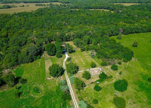 Property at 3100 E 303rd St, Cleveland, MO 64734, 5 beds, 4.5 baths