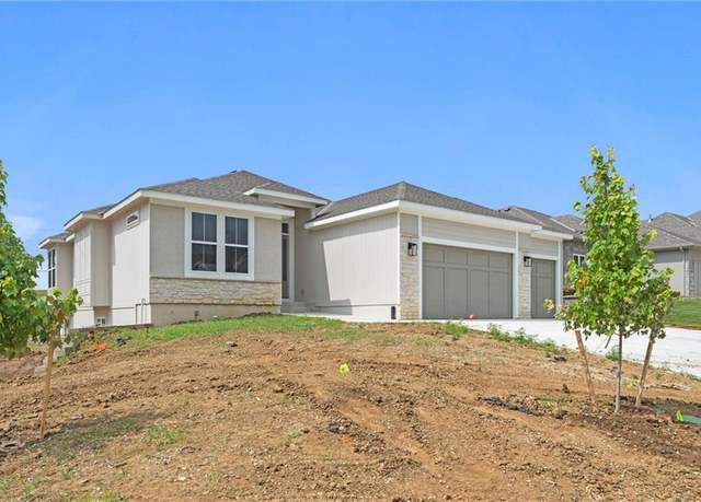 Property at 9845 104th St, Kansas City, MO 64157, 4 beds, 3 baths