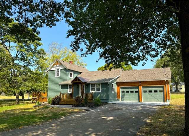 Property at 407 S Paola St, Paola, KS 66071, 3 beds, 2 baths
