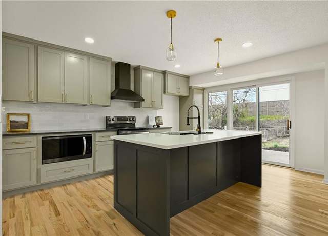 Property at 9408 Goddard St, Overland Park, KS 66214, 4 beds, 3 baths