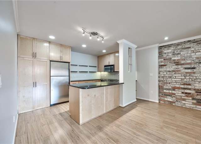 Property at 5008 Baltimore Ave #102, Kansas City, MO 64112, 2 beds, 2 baths