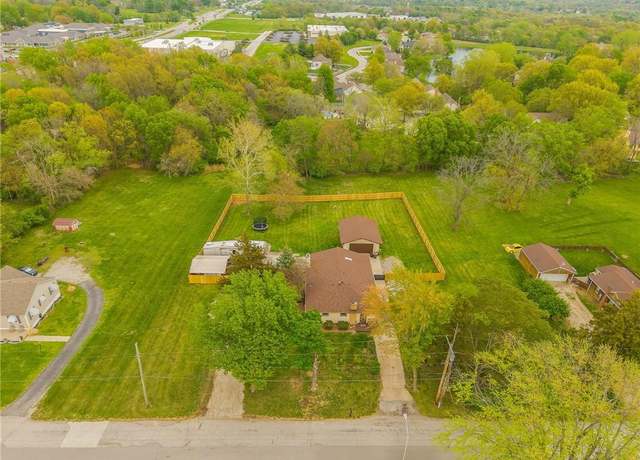 Property at 8317 N Pontiac Ave, Kansas City, MO 64151, 4 beds, 3 baths