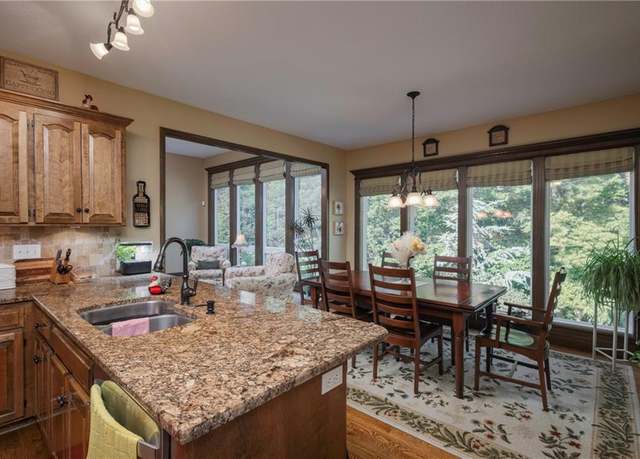 Property at 1128 N Old Mill Rd, Independence, MO 64056, 4 beds, 3 baths