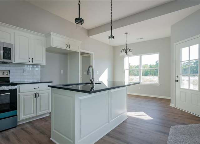 Property at 1306 NE Sequoia Ct, Oak Grove, MO 64075, 3 beds, 2 baths