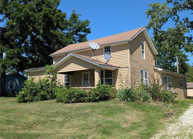 Property at 707 N 4th St, La Cygne, KS 66040, 4 beds, 2 baths