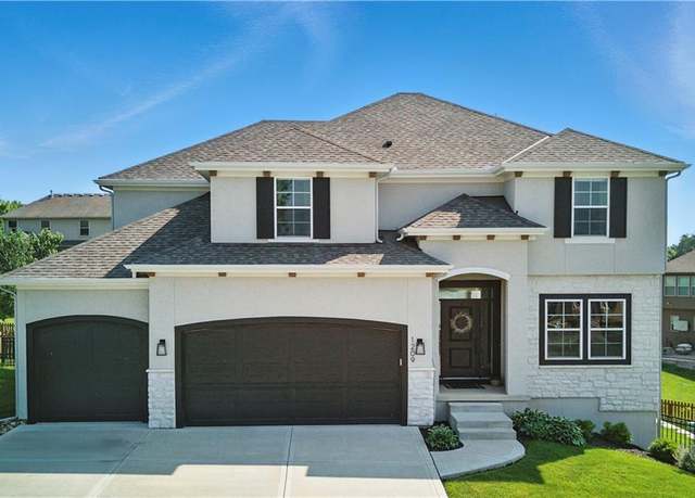 Property at 1209 Brunswick Ln, Raymore, MO 64083, 5 beds, 4 baths