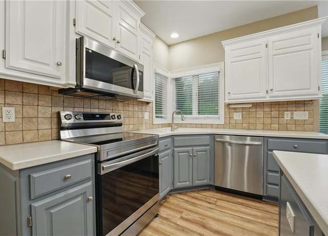 Property at 4904 W 162nd St, Overland Park, KS 66085, 4 beds, 4 baths