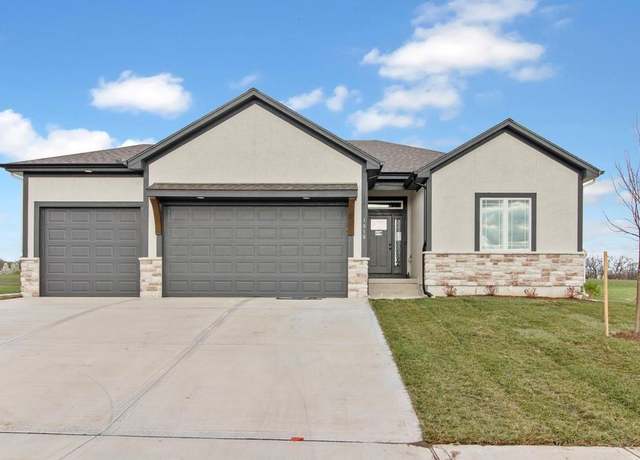 Property at 1818 Woodward Cir, Raymore, MO 64083, 4 beds, 3 baths