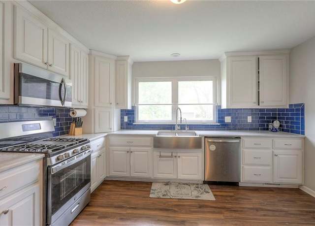 Property at 1321 E 126th St, Grandview, MO 64030, 4 beds, 2 baths
