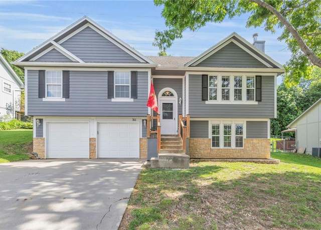 Property at 311 SW 24th Ter, Oak Grove, MO 64075, 4 beds, 2.5 baths