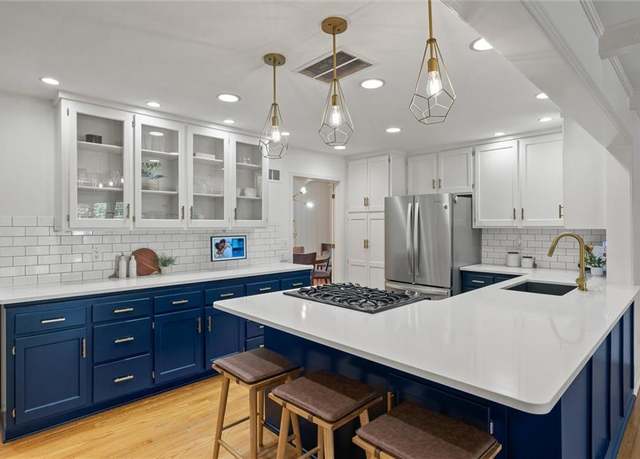 Property at 9824 Sagamore Rd, Leawood, KS 66206, 4 beds, 3.5 baths