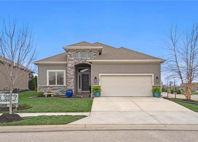Property at 11695 S Deer Run St, Olathe, KS 66061, 4 beds, 3 baths