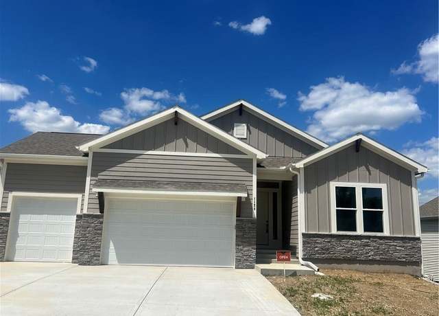 Property at 1128 SW Whitby Dr, Lee's Summit, MO 64083, 4 beds, 3.5 baths