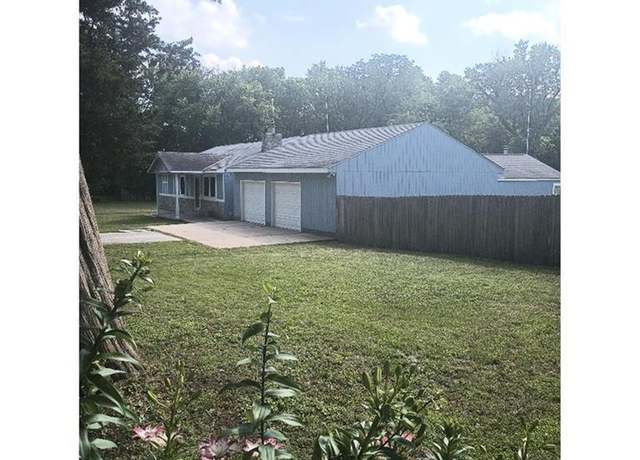 Property at 1712 S Hands St, Independence, MO 64055, 4 beds, 3 baths