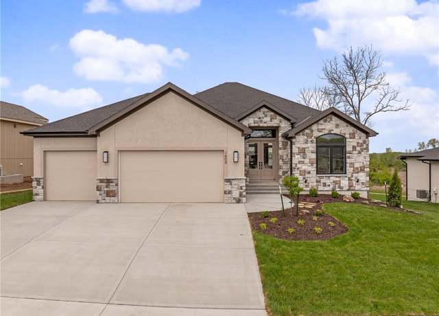 Property at 1404 Kintyre Ct, Raymore, MO 64083, 4 beds, 4 baths