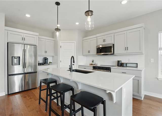 Property at 1024 Branchwood Ln, Raymore, MO 64083, 2 beds, 2 baths
