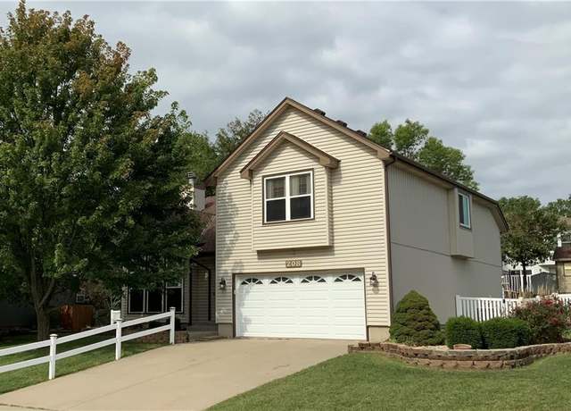 Property at 208 N Pacific Ct, Raymore, MO 64083, 4 beds, 3 baths