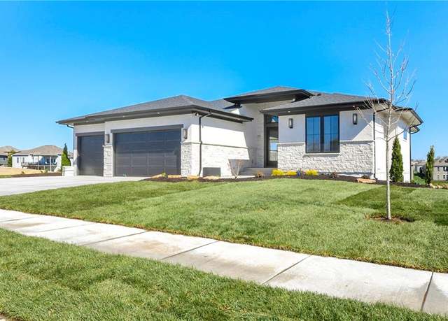 Property at 3925 SW Flintrock Dr, Lee's Summit, MO 64082, 4 beds, 4.5 baths
