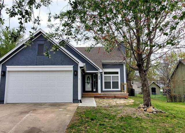 Property at 405 17th South Ave, Greenwood, MO 64034, 4 beds, 4 baths