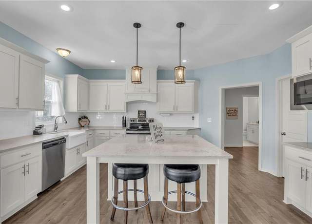 Property at 24305 W 58th Cir, Shawnee, KS 66226, 5 beds, 4 baths