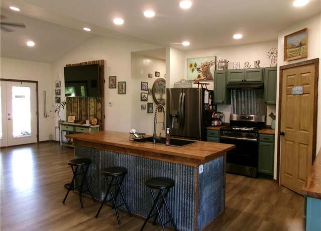 Property at 201 N Delray Dr, Urich, MO 64788, 4 beds, 3 baths